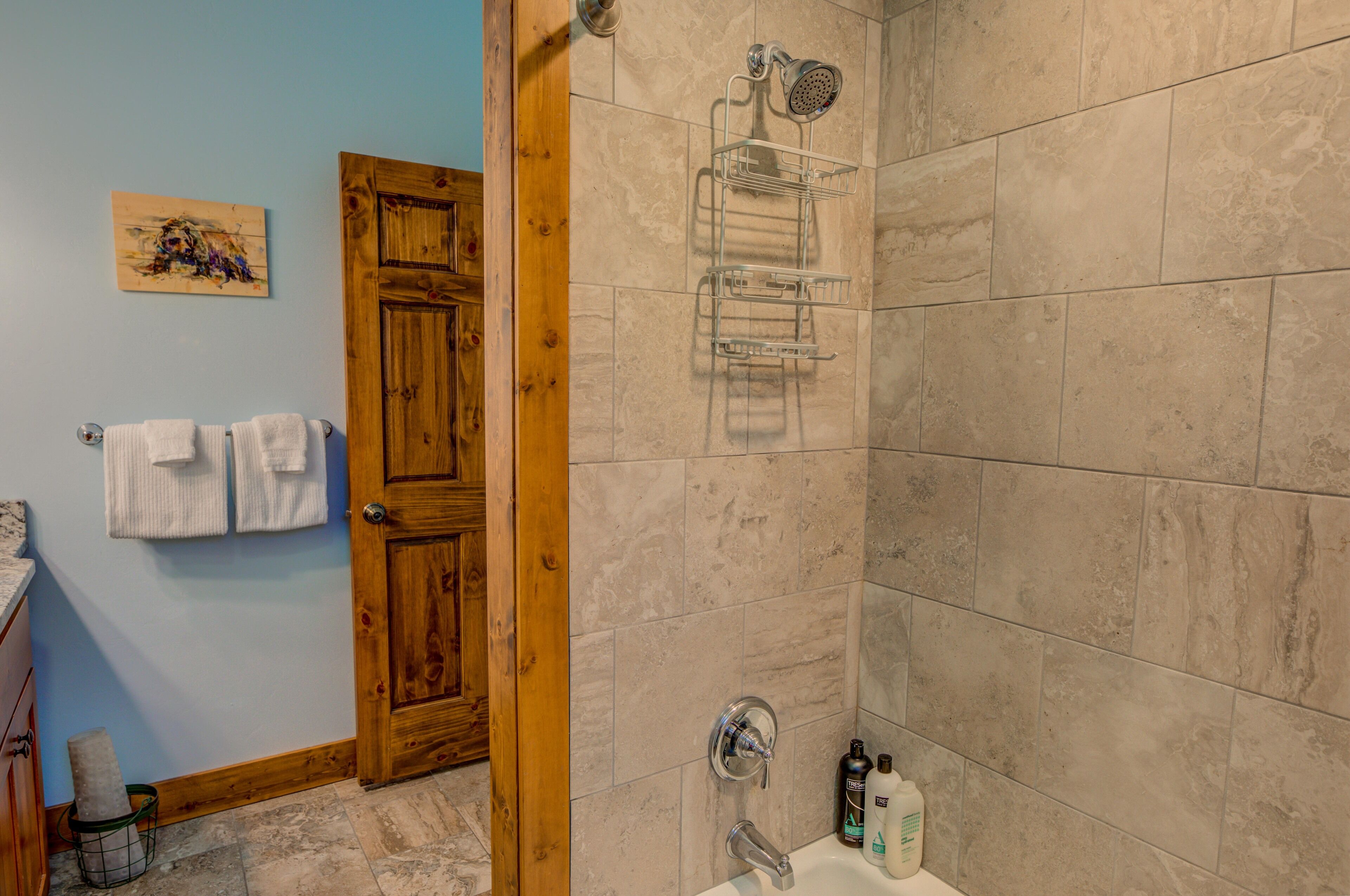 Combined shower/tub, hair dryer, towels, soap
