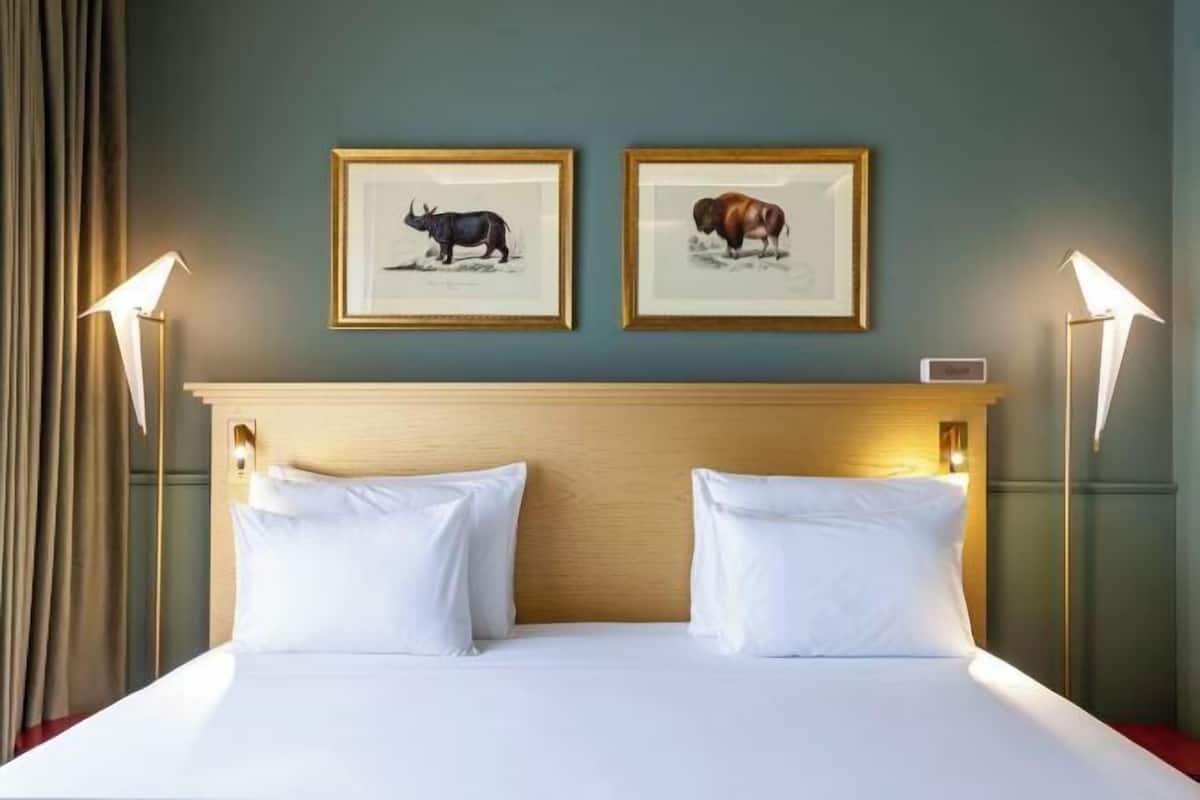 1 Schlafzimmer, hochwertige Bettwaren, Daunenbettdecken, Minibar