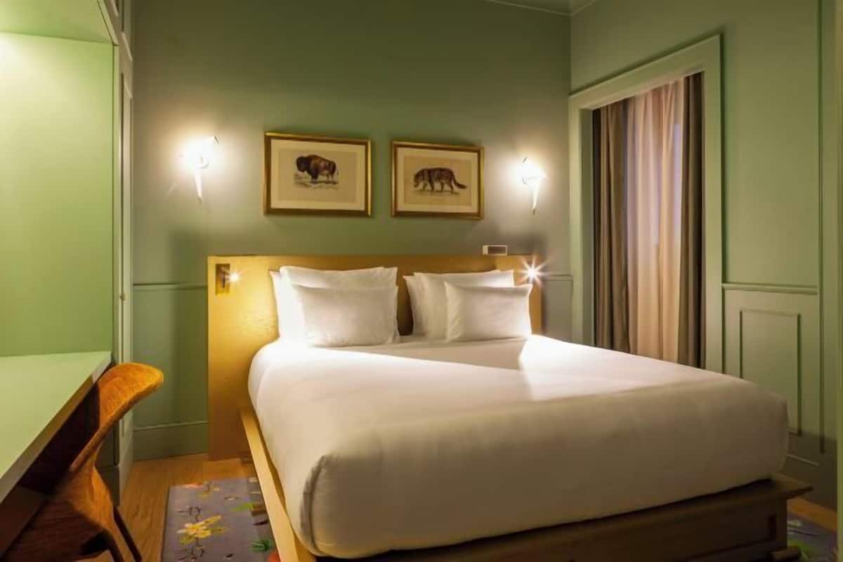 1 Schlafzimmer, hochwertige Bettwaren, Daunenbettdecken, Minibar
