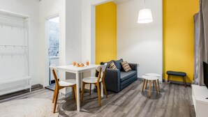 Studio, plusieurs chambres | Salle de séjour