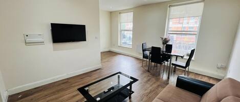 Leilighet, 1 queensize-seng | Oppholdsområde