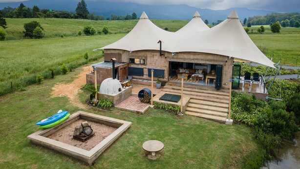 A house with a unique conical roof structure, a barbecue area, and a small pool. - Belvidere Country Estate (Howick)