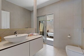 Bathtub, hair dryer