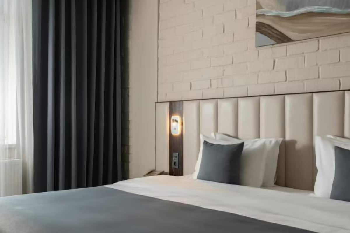 Hypo-allergenic bedding, down comforters, memory foam beds, minibar