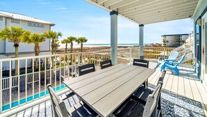 A covered outdoor patio with a pool, seating, and a view of the beach. - 🌊3 Generations Beach House | Beachfront | Private Pool | Sleeps 17 (Santa Rosa Beach)