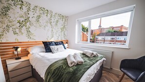 3 slaapkamers, een strijkplank/strijkijzer, beddengoed