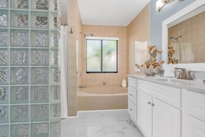 Bathtub, hair dryer, towels