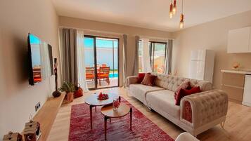 Family Villa | Living area | Flat-screen TV