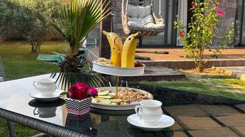 Perhehuvila | Näkymä puutarhaan