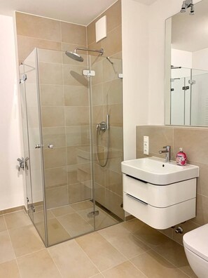 Hair dryer, towels, soap, toilet paper