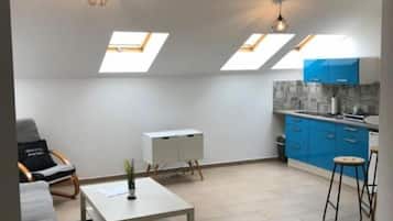 Flat-screen TV, video-game console