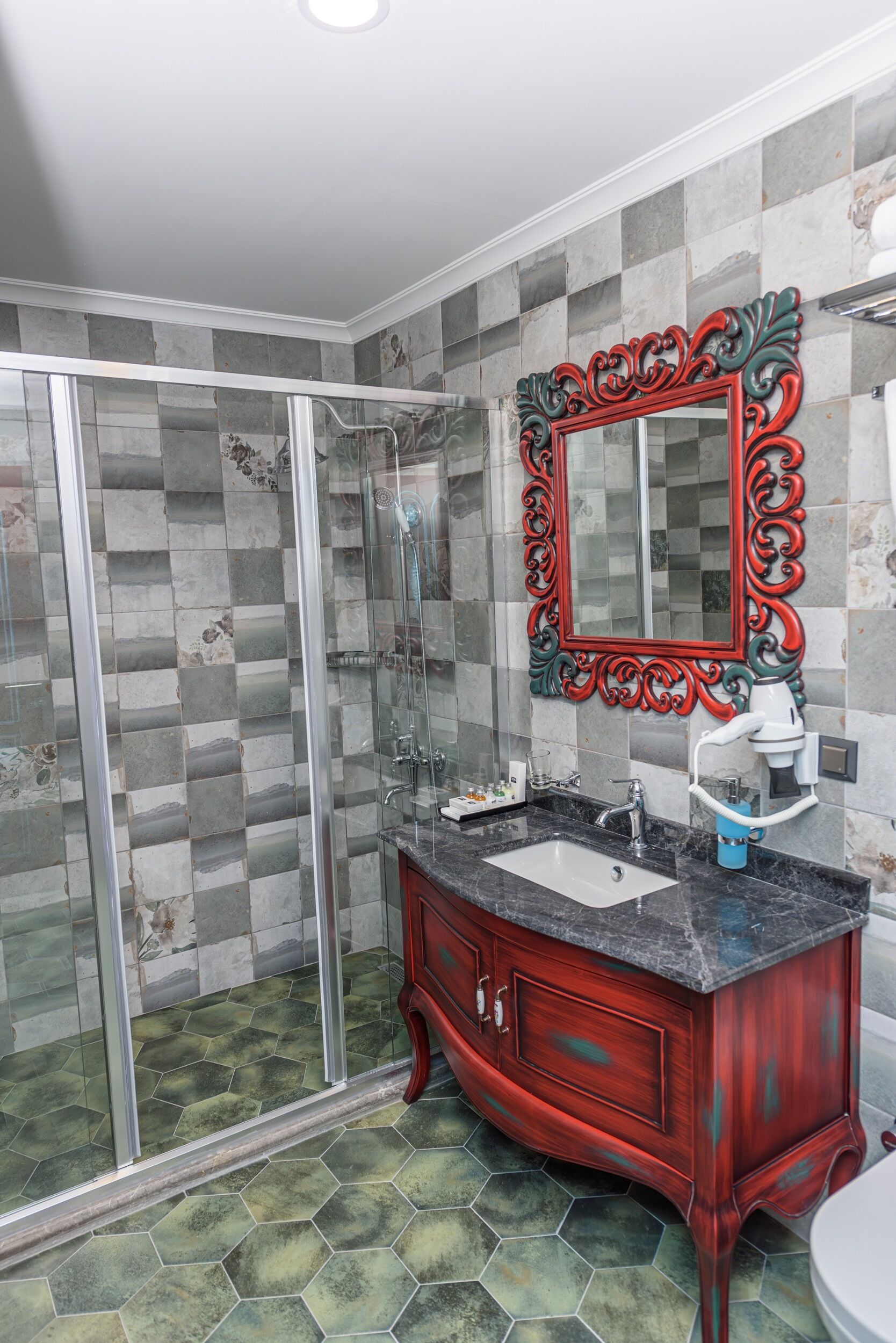 Shower, rainfall showerhead, designer toiletries, hair dryer