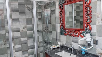 Shower, rainfall showerhead, designer toiletries, hair dryer