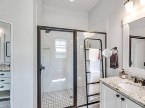 Shower, hair dryer, towels