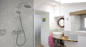 Shower, hair dryer, towels, soap