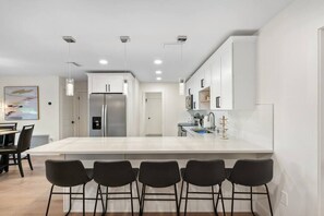 Fridge, cookware/dishes/utensils - Scenic Getaway Home: 3BR 2Bath Minutes to Beach (Nokomis)