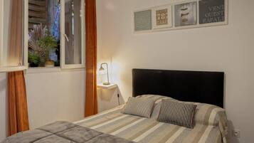 2 dormitorios, tabla de planchar con plancha, wifi y ropa de cama