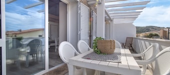 Apartamento 'Le Palme's' con balcón, Wi-Fi y aire acondicionado