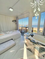 Quarto com Hidromassagem interna | Beach/ocean view