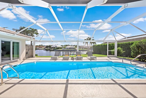 Casa, várias camas (Direct boating access home in Olde Ma) | Piscina | Piscina aquecida