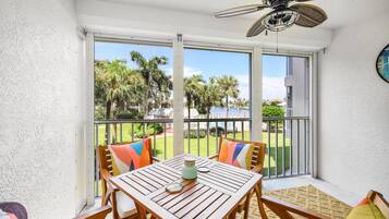 Condo, 1 Queen Bed (Waterfront condo with pool and pickle) | Dining