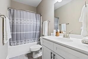 Hair dryer, towels, soap, shampoo