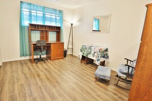 A room with a desk, chair, bed, and a ladder. - Eclectic Oasis on Brown, Pet Friendly (Tucson)