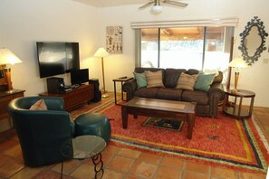 TV, fireplace - Experience true desert living in this classic Tucson ranch in the Tanque Verde Valley (Tucson)