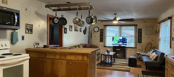 Rustic home on wooded lot, very private. Lake and dock access. Close to trails.