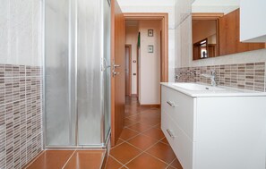 Regadera y secadora de cabello 