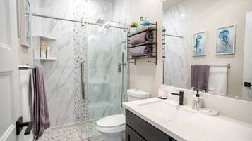 Hair dryer, towels, soap, shampoo