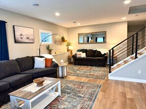 Smart TV, fireplace, books, printers