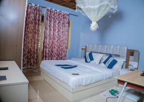 Chambre Deluxe double ou avec lits jumeaux | Accès au Wi-Fi (inclus)