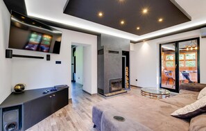 Smart TV, fireplace, table football, stereo