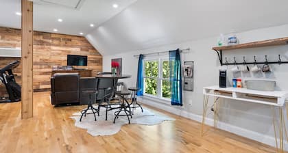 Studio above a detached garage away from main house on a private lot.