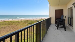 A balcony with a view of the beach and ocean. - Luxury beachfront condo with the best ocean view! (South Padre Island)