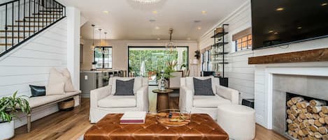 TV, fireplace, books, offices