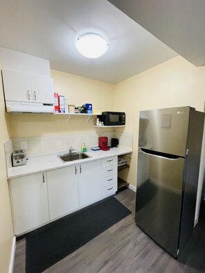 Fridge, microwave, coffee/tea maker, electric kettle
