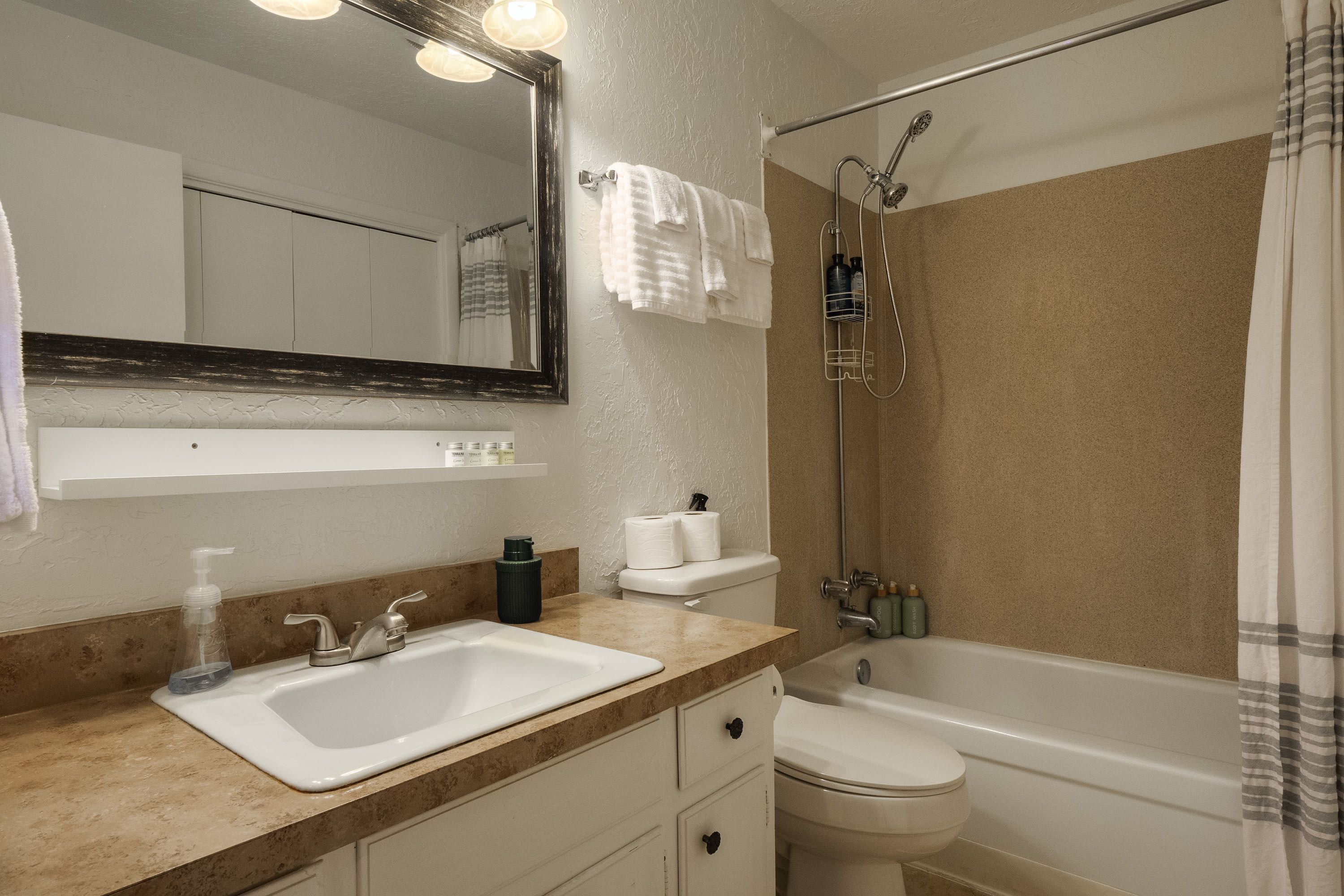 Bathtub, hair dryer, towels