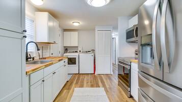 Microwave, stovetop, toaster, cookware/dishes/utensils