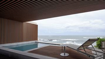 Suite, balkon, uitzicht op oceaan | Uitzicht op strand/zee