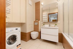 Bathtub, hair dryer, shampoo