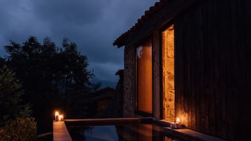 Escape to a serene retreat surrounded by lush greenery and a tranquil pool.