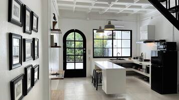 Fridge, microwave, cookware/dishes/utensils, spices