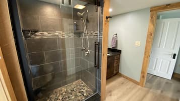 Shower, towels, soap, toilet paper