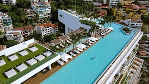 Imagine yourself swimming in one of the largest pools in the world - Soho PV • 2 Workspaces, Pool, Gym & Rooftop Bar (Puerto Vallarta)