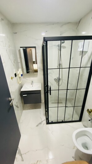 Deluxe Room, 1 Bedroom, Smoking, City View | Bathroom | Separate tub and shower, rainfall showerhead, free toiletries - The North Hotel (Istanbul)
