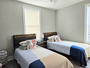 3 bedrooms, desk, iron/ironing board, travel crib