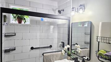 Hair dryer, towels, soap, shampoo