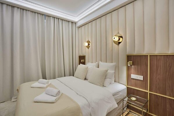 2 dormitorios, tabla de planchar con plancha, wifi gratis y ropa de cama